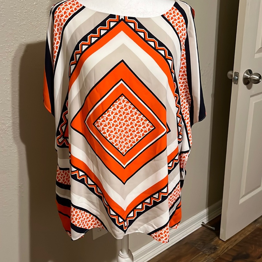 travelers by Chico’s blouse  Cream, black, red-orange and khaki. Size: L/XL